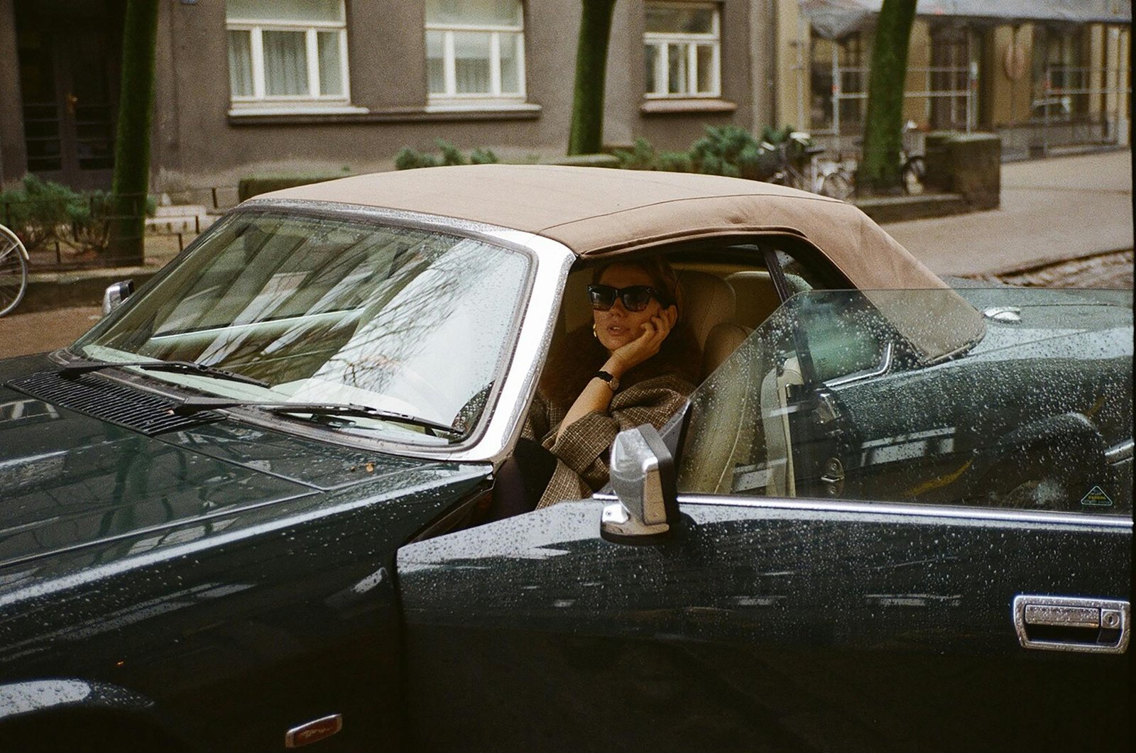 Person having a phone call inside a car