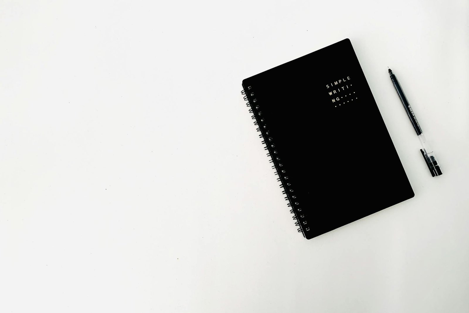 Notebook and pen on a desk