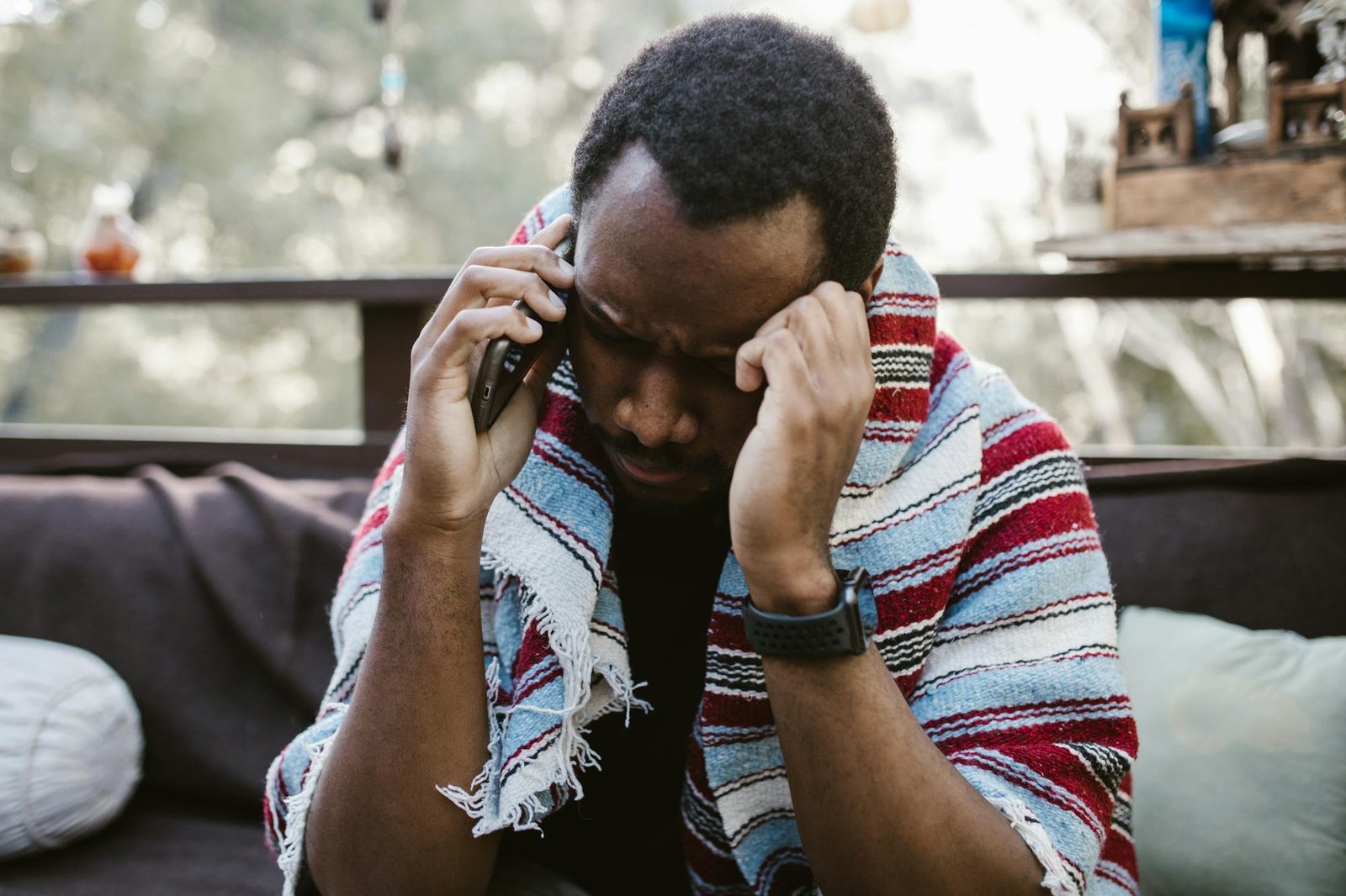 Person speaking on the phone for support