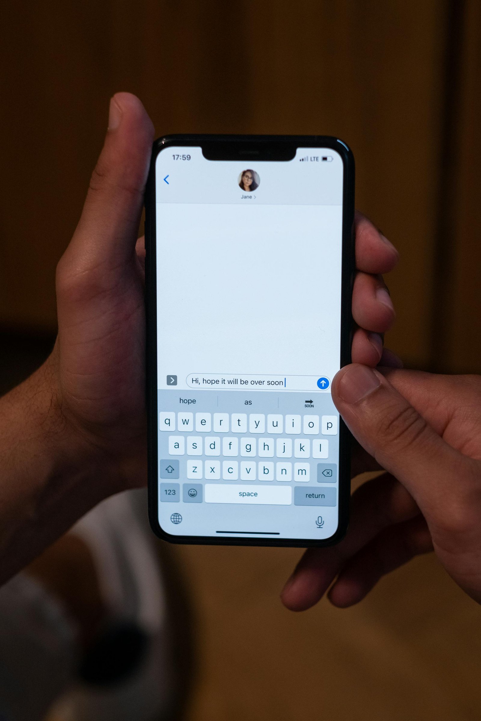 Person texting on a smartphone
